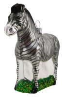 Königliches Zebra ziert mit Federspange und Kronenhütchen