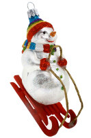 Schneemann auf Schlitten