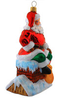 Weihnachtsmann auf Schornstein
