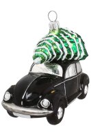 von oben ist der schwarze VW Käfer mit Tannenbaum...