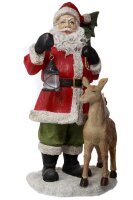 Weihnachtsmann mit Reh und Laterne
