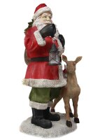 Weihnachtsmann mit Reh und Laterne