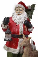Weihnachtsmann mit Reh und Laterne