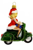 Die Ms. Santa auf dem Motorroller wurde zu einem Symbol...